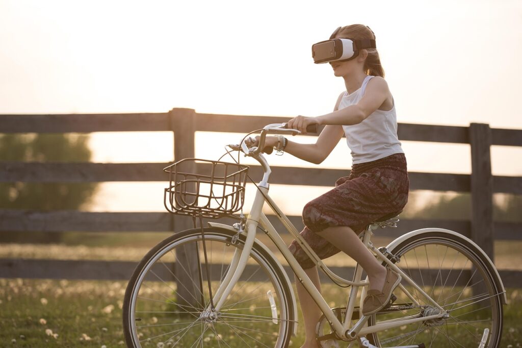 augmented reality, bicycle, girl, bike, child, cyclist, fence, fun, outdoors, person, virtual reality, metaverse, virtual reality glasses, virtual reality goggles, virtual reality headset, vr headset